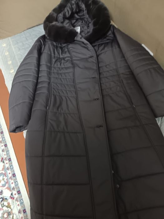 Продам пуховик зимний новый