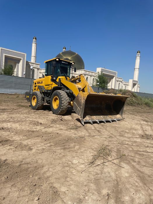 Услуги фронтального погрузчика: планировка, срезка, погрузка