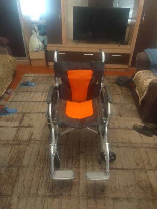 Продам инвалидное кресло каталку