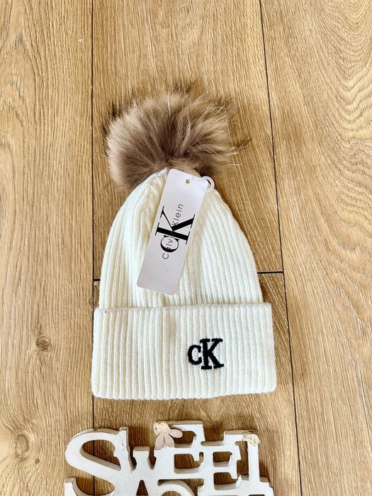 Разкошни шапки СК,The North face,Miu Miu с етествен пух