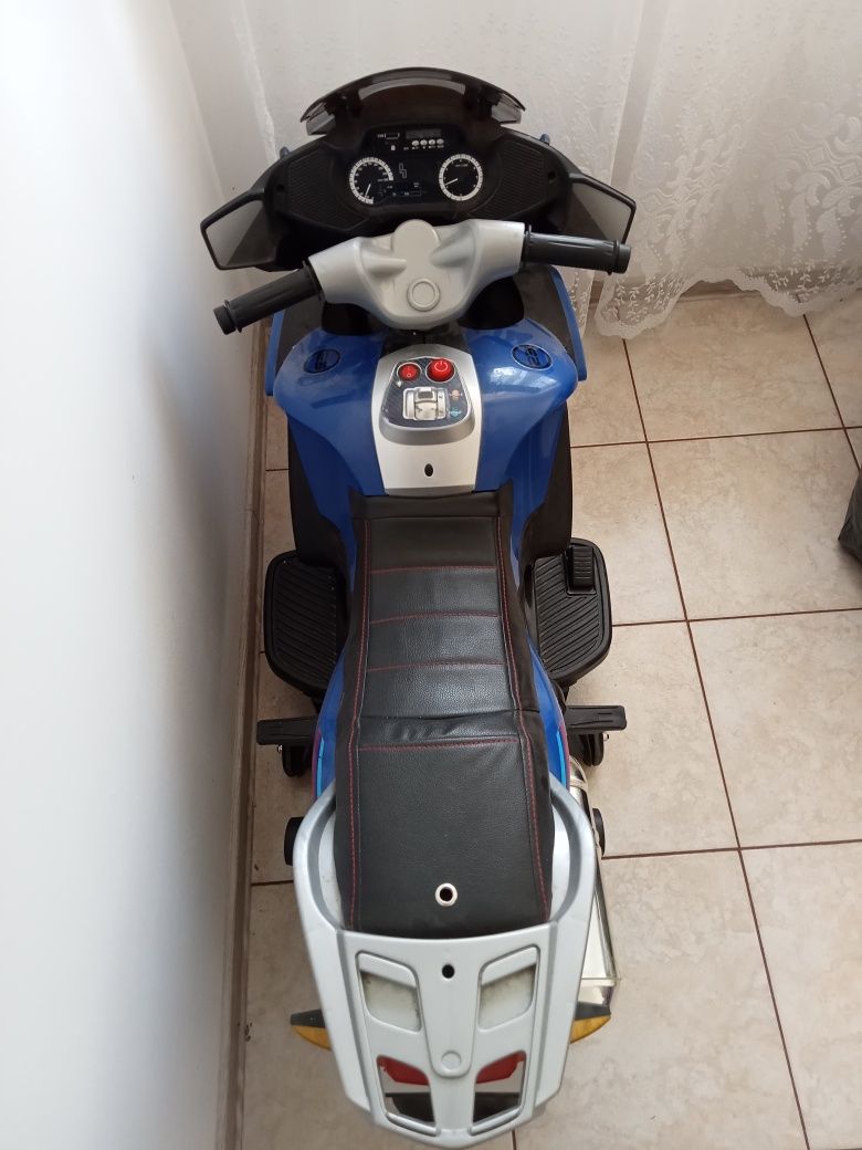 Vând motocicleta electrica copii