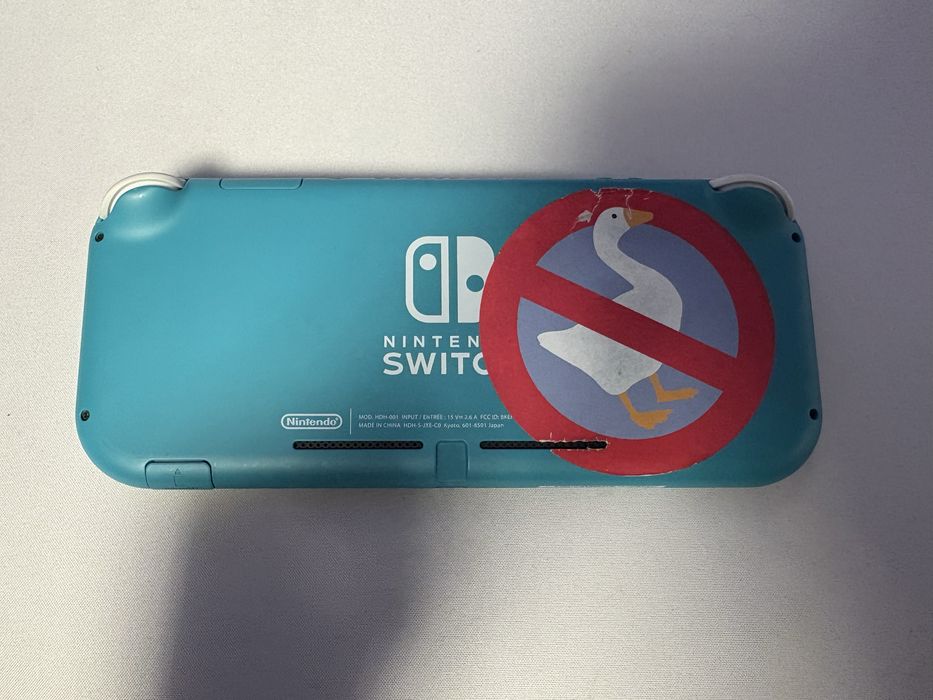 Nintendo Switch Lite +7 jocuri