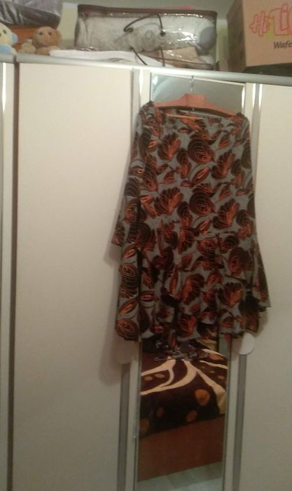 Rochii de ocazie și costume.