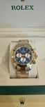 Rolex daytona gold