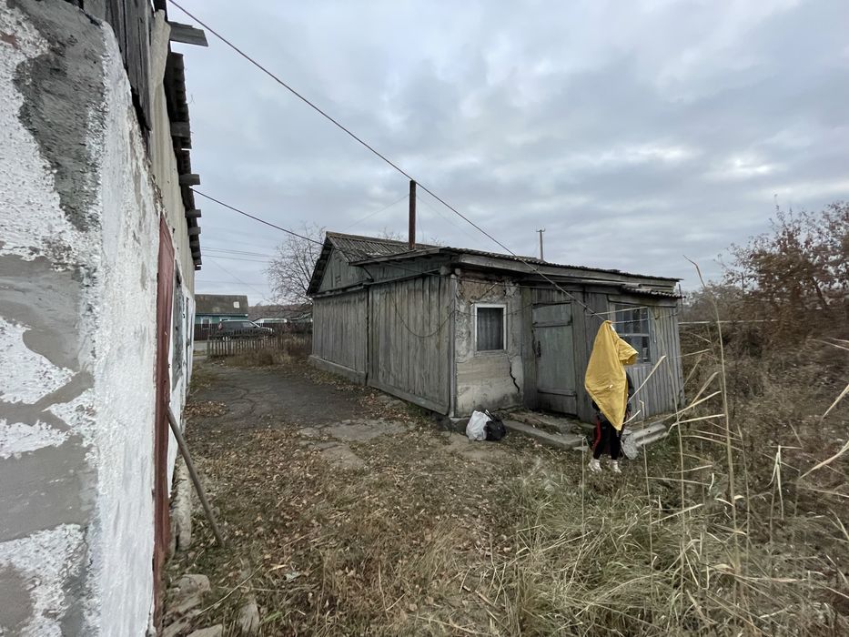 Продам земельный участок с постройками