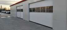 Usa de garaj sectionala izolata 2500L/2000H + automatizare cu 2 telec.