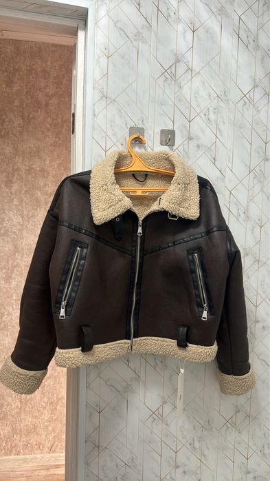 Продам дубленку новую