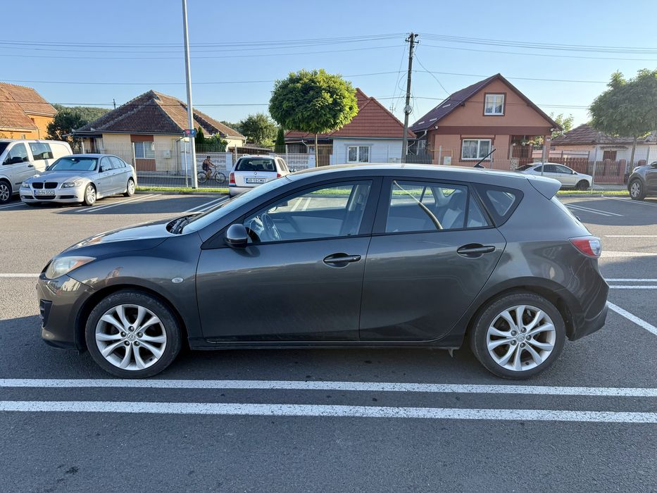 Mazda 3 2009 105cp