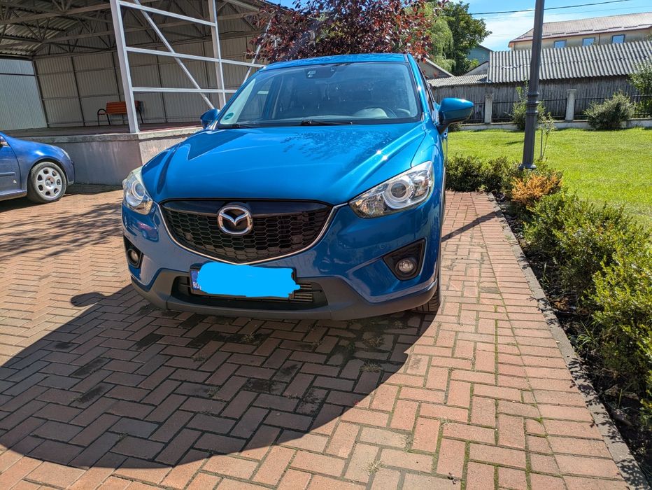 Mazda CX-5, an 2013, 4x4 automata.