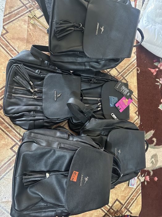 Продам новые кожаные рюкзаки