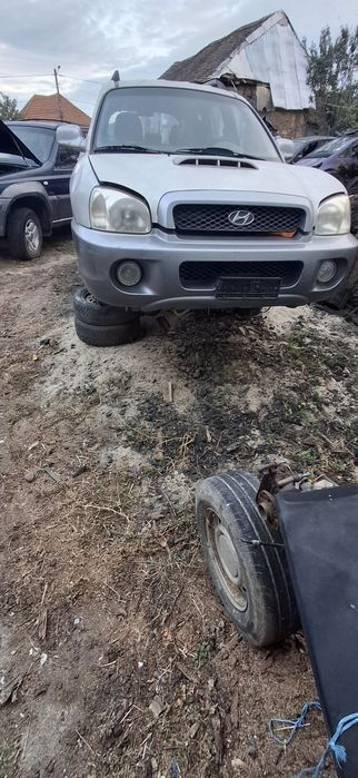 Dezmembrez Hyundai santa fe 2l 4×4 2003 cutie manuala