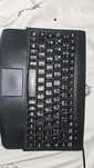 Tastatura cu mousepad incorporat