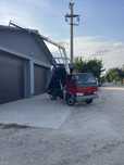 Nissan Cabstar Bascula si Macara 2003 3.0 120CP E3 3.5 Italia