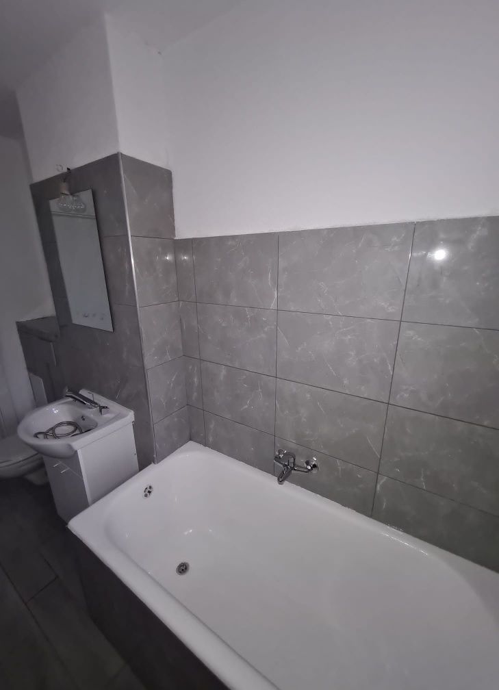 Apartament doua camere,parter inalt