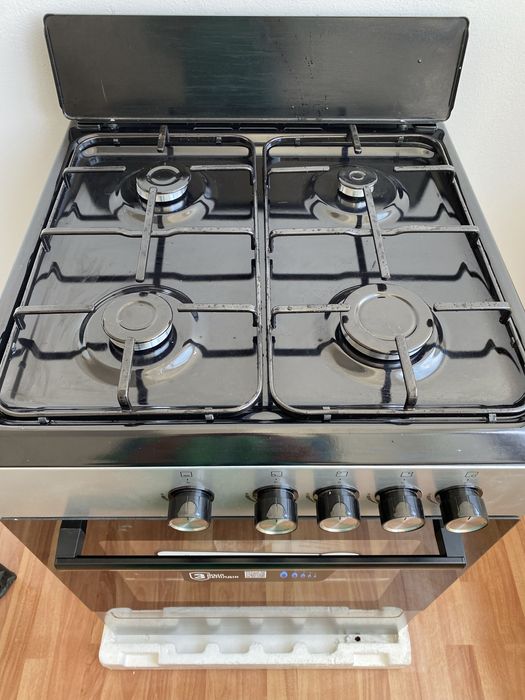 Плита газовая,черный плита новый