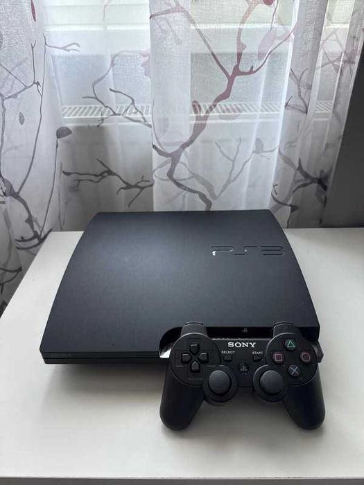 PlayStation 3 Slim + 2 Jocuri + Controller