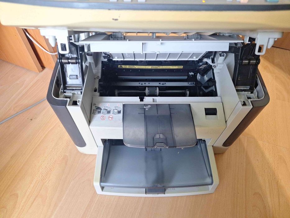 Лазерен принтер, копир, скенер, факс  МФУ HP Laserjet M1522NF