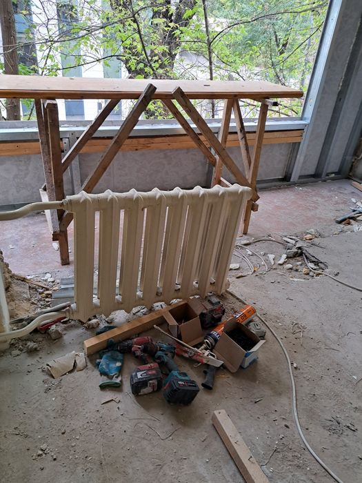 Радиаторы  чугунные б/у