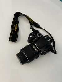 Nikon DSLR model D5100 aparatul este NOU