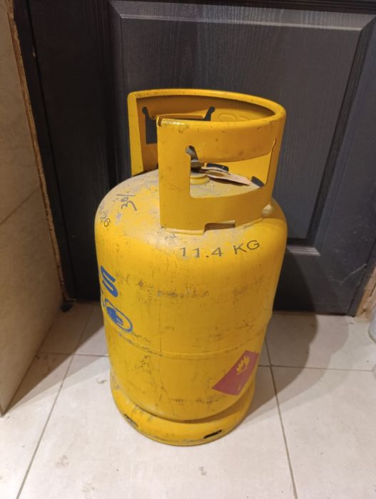 Vând butelie galbenă