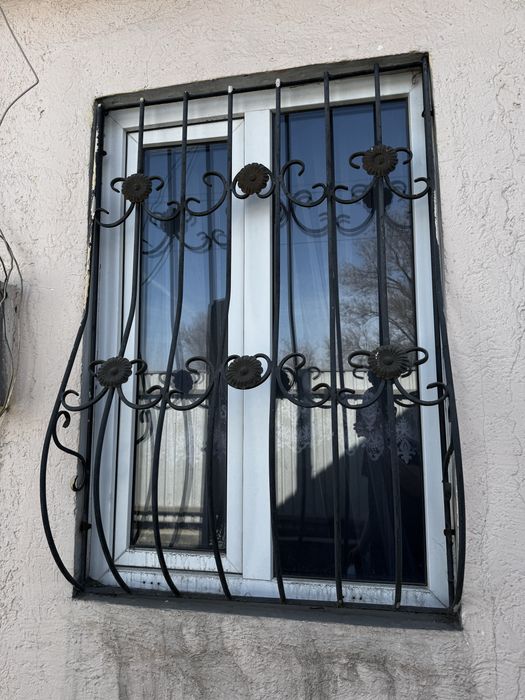 Пластиковые окна с решетками