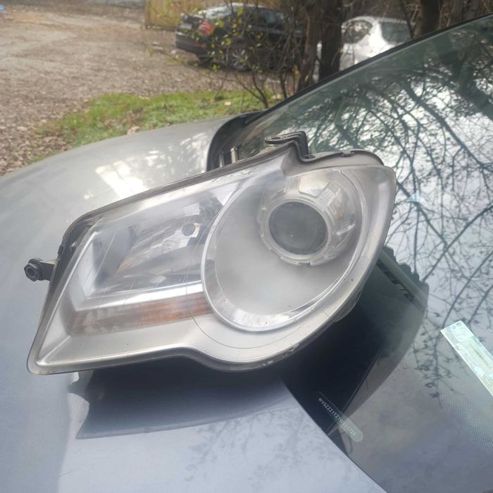 Оригинални фарове Tuoran VW