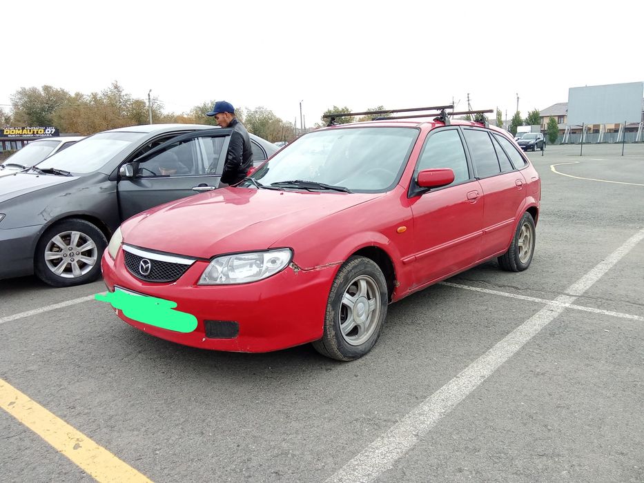 Мазда 323 BJ 2003 года