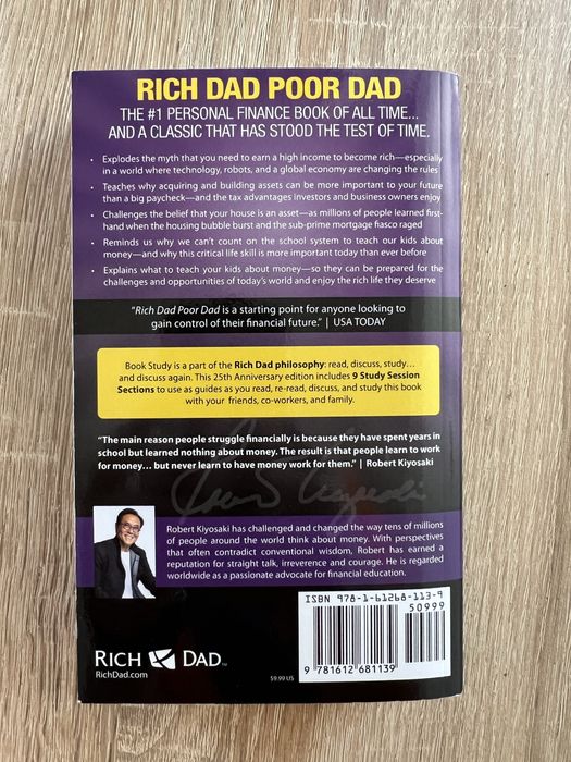 Rich Dad Poor Dad by Robert Kiyosaki and Sharon Lechter