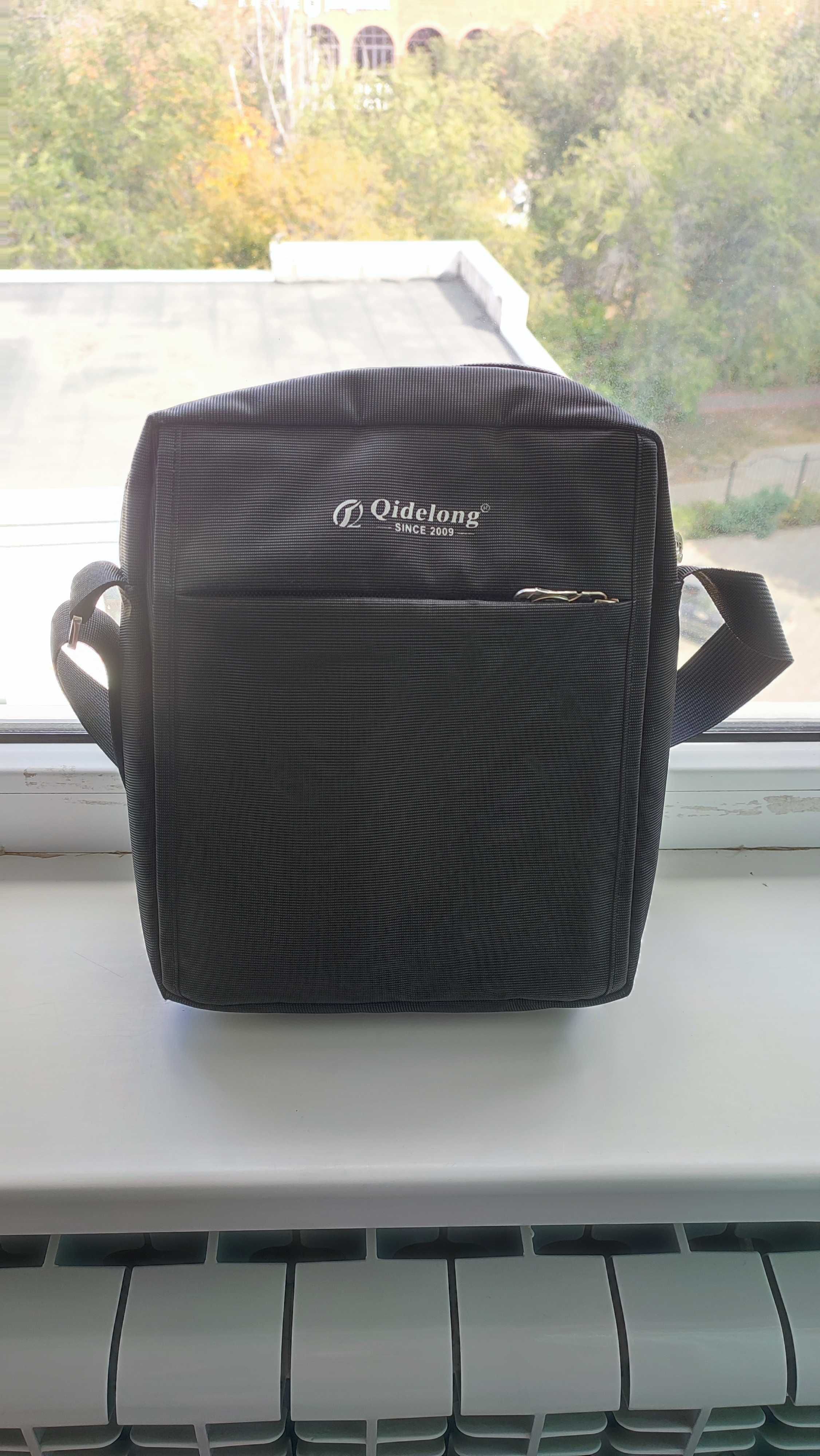 Продам качественную сумку Qidelong