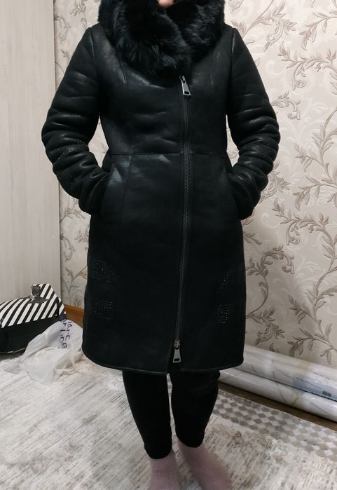 Продам дублёнку женскую зимнюю. Длинная, тёплая.