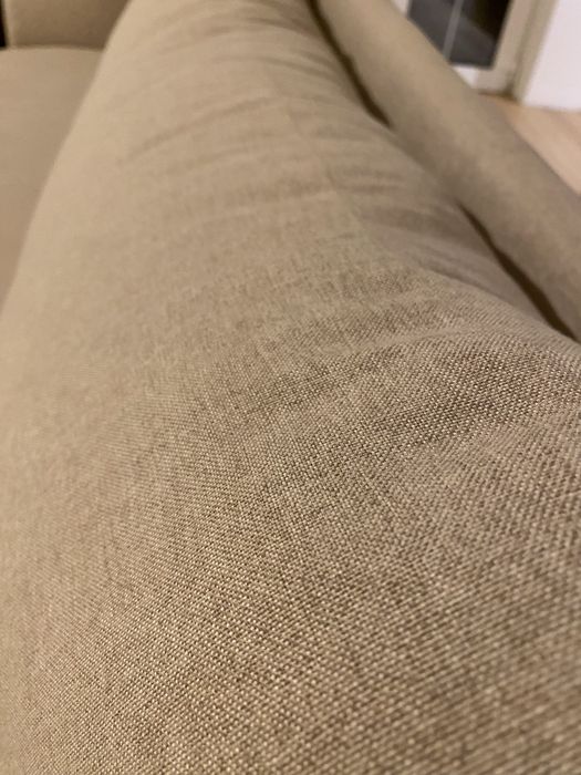 Canapea crem din material tip in noua