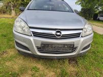 Grilă centrală radiator cu emblemă Opel Astra H facelift 2008