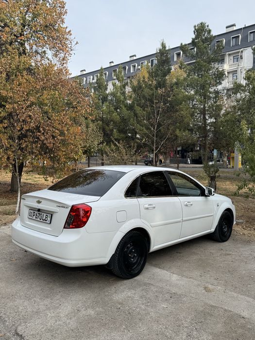 Срочна сотилади Ласетти 1.6 2013й Гентра килинган!