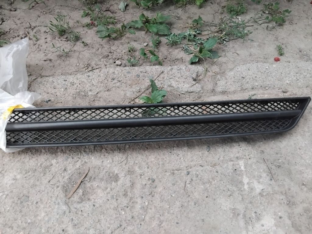 Нексия на бампер улыбка