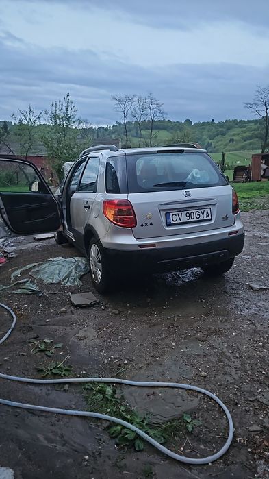 Se vinde FIAT SEDICI 4X4. Caroserie și motor de Suzuki SX4