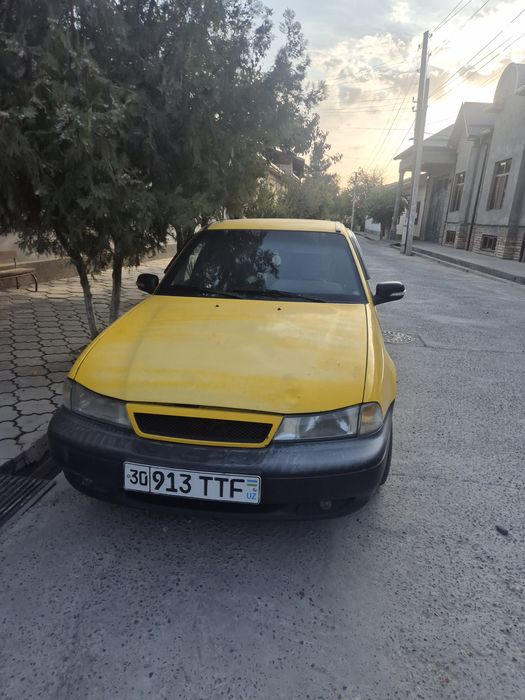 Nexia 1 Daewoo  sariq firmada turibti xoxlagan vaqt chiqarib aformit