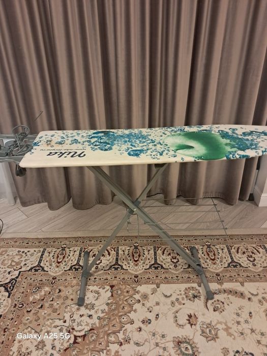 Гладильная доска с сушилкой.