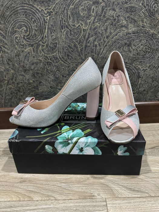 Tufli bruna brendiniki 1 marta kiyilganp