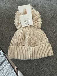 Зимна шапка за новородено