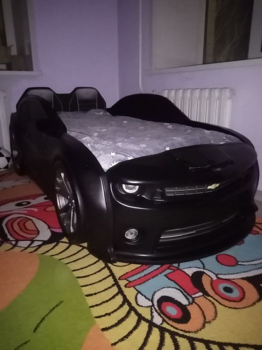 Продам машинку кроватку марки Шевроле Камару в хорошем состоянии