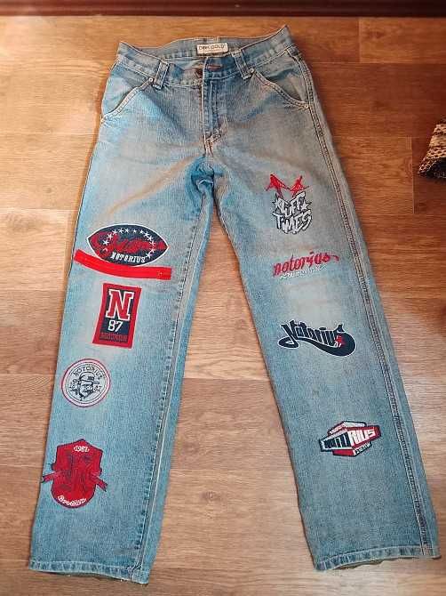 Джинсы молодежные широковатые, голубого цвета,  разм. 42-44 (W28-29)