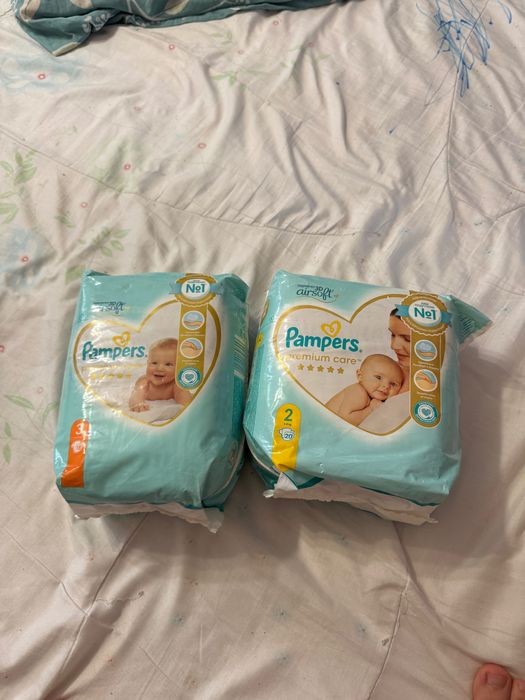 Продам памперсы pampers premium care