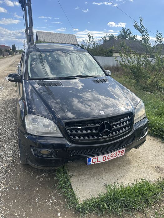 Capota Mercedes  ML W164 ML320CDI faruri aripi portiere stop stanga