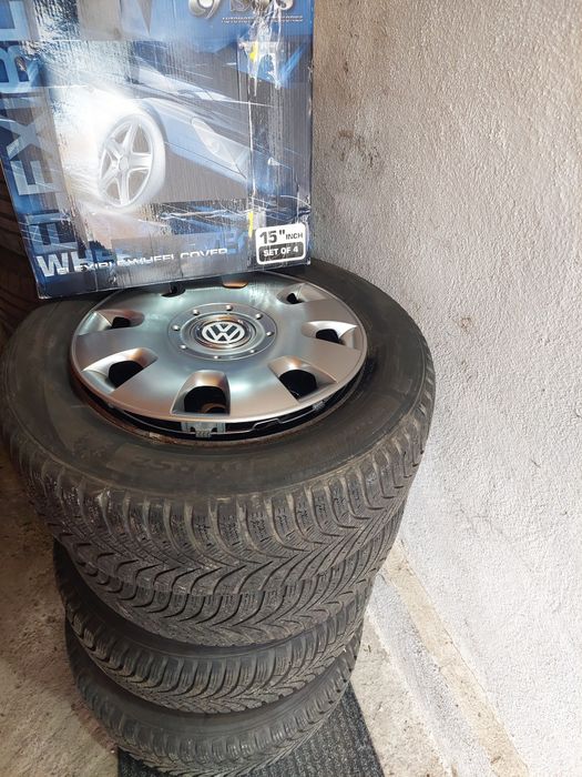 Anvelope iarna cu jante 205  55  r15 + set capace noi