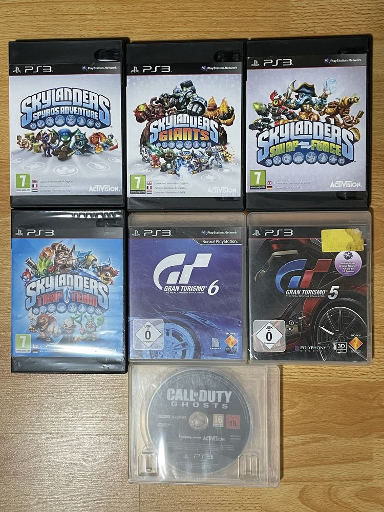 Sony PlayStation 3 fat modat cu jocuri si figurine