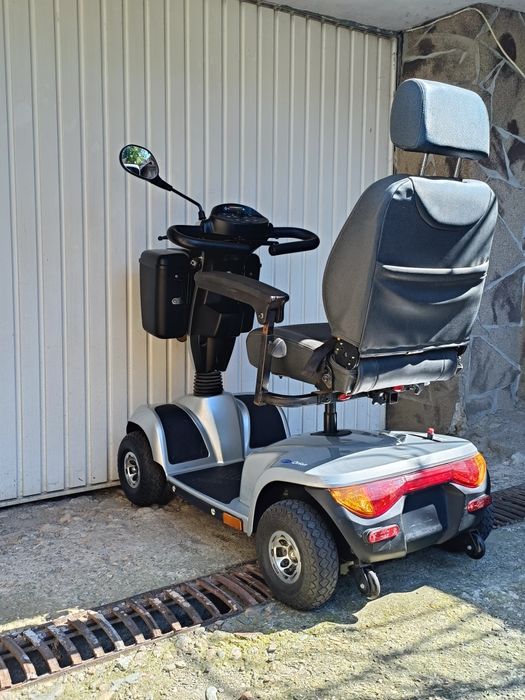 Carucior scuter electric scaun dizabilitati  carut tricieleta handicap