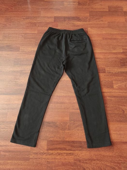 Pantaloni Nike flared