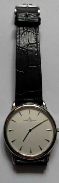 Baume Mercier Geneve 
 quartz, aur alb 18 k