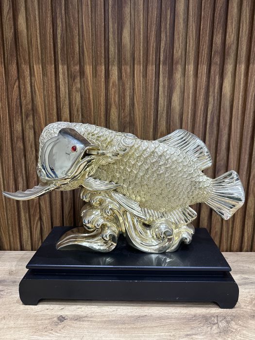 Золотая рыбка с монеткой