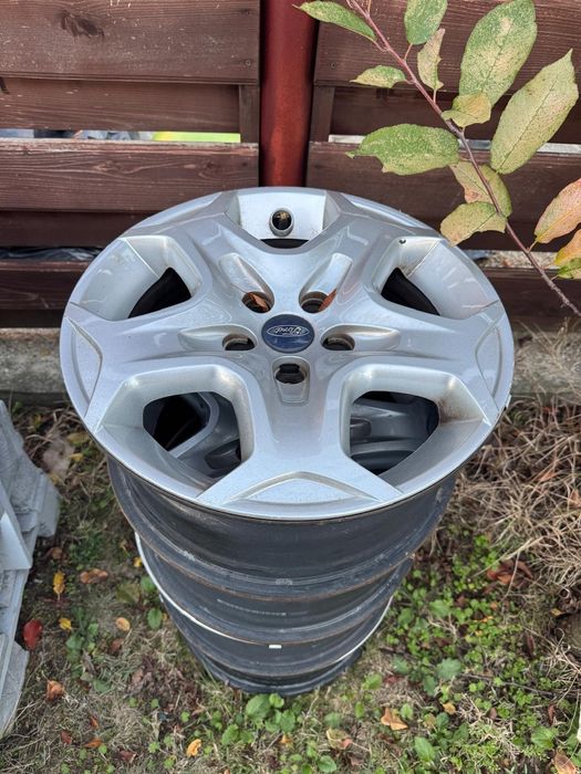 jante FORD  originale structurate cu capace Y , 16 zoll